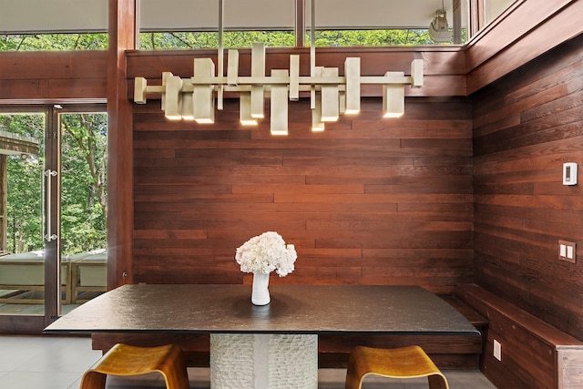 100 Old Pascack Rd, Pearl River, NY 10965 - tiled dining area with wood walls