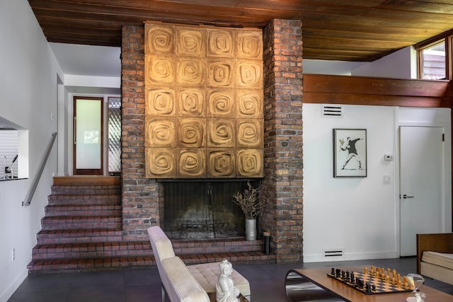100 Old Pascack Rd, Pearl River, NY 10965 - tiled living area with wooden ceiling, a fireplace, baseboards, and stairway