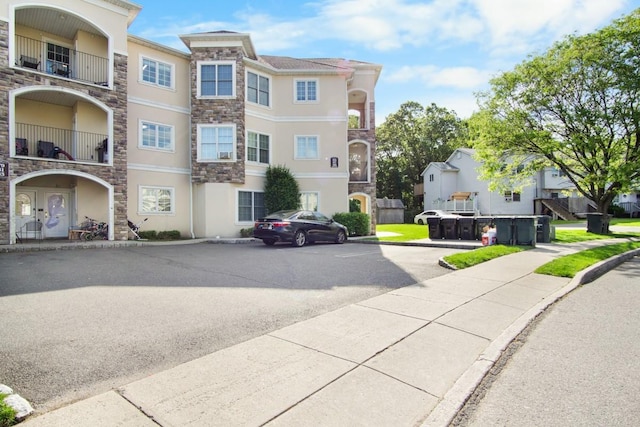 87 Horton Dr, Monsey, NY 10952 - view of building exterior featuring uncovered parking and a residential view