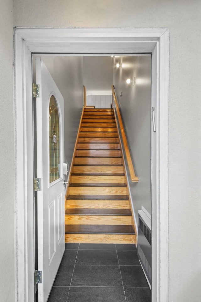 87 Horton Dr, Monsey, NY 10952 - staircase with radiator and tile patterned floors