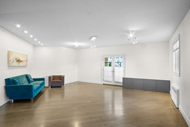 87 Horton Dr, Monsey, NY 10952 - sitting room featuring wood finished floors, french doors, and baseboards