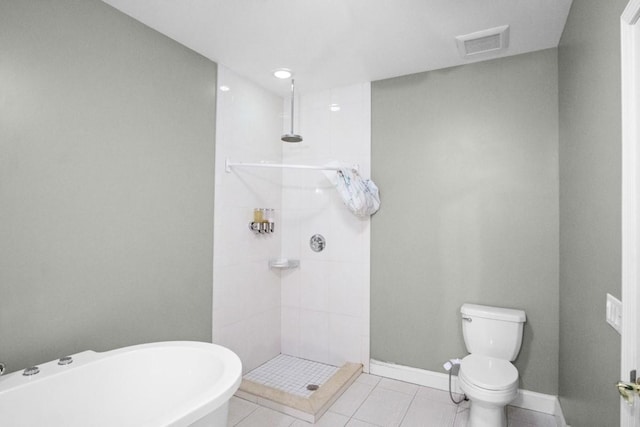 87 Horton Dr, Monsey, NY 10952 - full bath featuring a soaking tub, tile patterned flooring, a tile shower, toilet, and baseboards