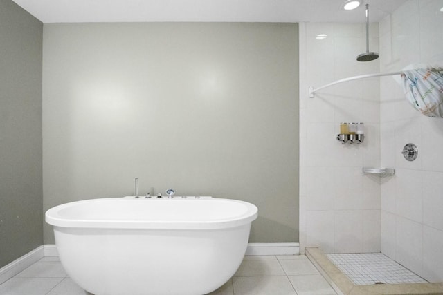 87 Horton Dr, Monsey, NY 10952 - bathroom featuring tile patterned floors, a tile shower, a freestanding bath, and baseboards