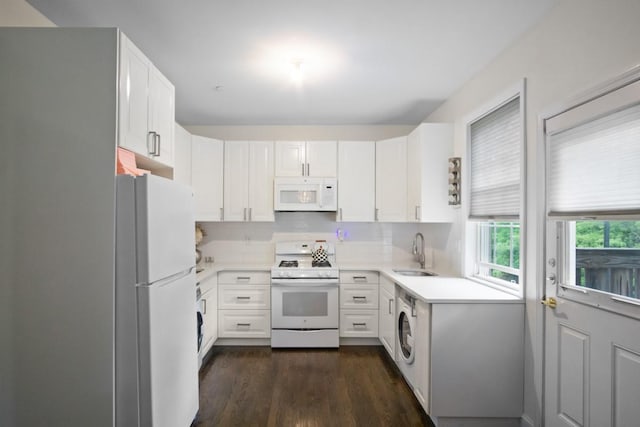 87 Horton Dr, Monsey, NY 10952 - kitchen with white appliances, a sink, washer / dryer, tasteful backsplash, and light countertops