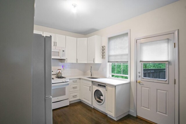 87 Horton Dr, Monsey, NY 10952 - kitchen with white appliances, washer / clothes dryer, a sink, and dark wood finished floors