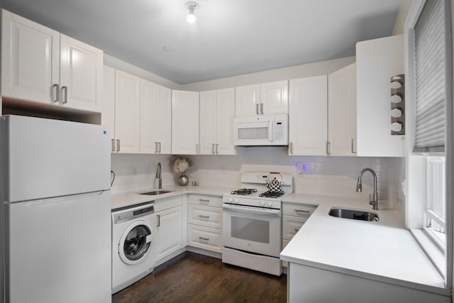 87 Horton Dr, Monsey, NY 10952 - kitchen featuring white appliances, washer / dryer, a sink, and tasteful backsplash