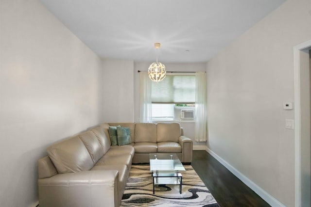 87 Horton Dr, Monsey, NY 10952 - living room with dark wood finished floors, baseboards, a chandelier, and cooling unit