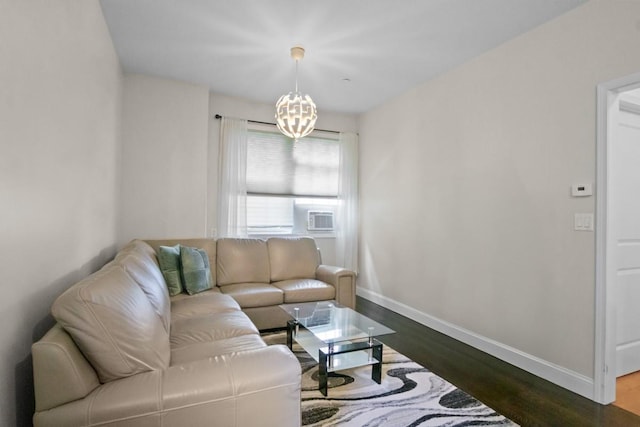 87 Horton Dr, Monsey, NY 10952 - living area with dark wood-type flooring, baseboards, and a chandelier