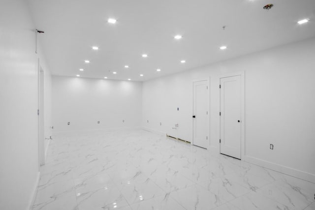 87 Horton Dr, Monsey, NY 10952 - basement featuring recessed lighting, baseboards, and light marble finish floors