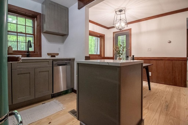 22 Mount Laurel Rd, Greenfield Park, NY 12435 - kitchen with dishwasher, a sink, light wood-type flooring, plenty of natural light, and wainscoting