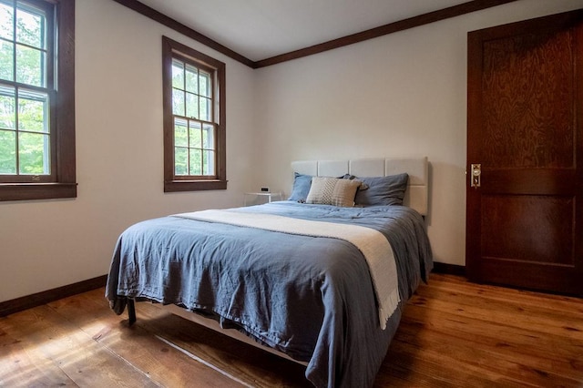 22 Mount Laurel Rd, Greenfield Park, NY 12435 - bedroom with wood finished floors, crown molding, and baseboards
