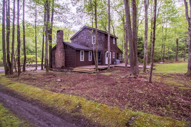 22 Mount Laurel Rd, Greenfield Park, NY 12435 - view of front of home with a deck and a chimney