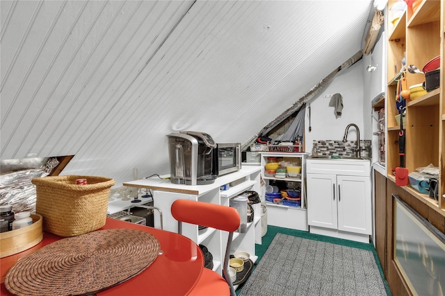 8 Cedar St, Tappan, NY 10983 - interior space with white cabinetry, lofted ceiling, stainless steel microwave, and tasteful backsplash