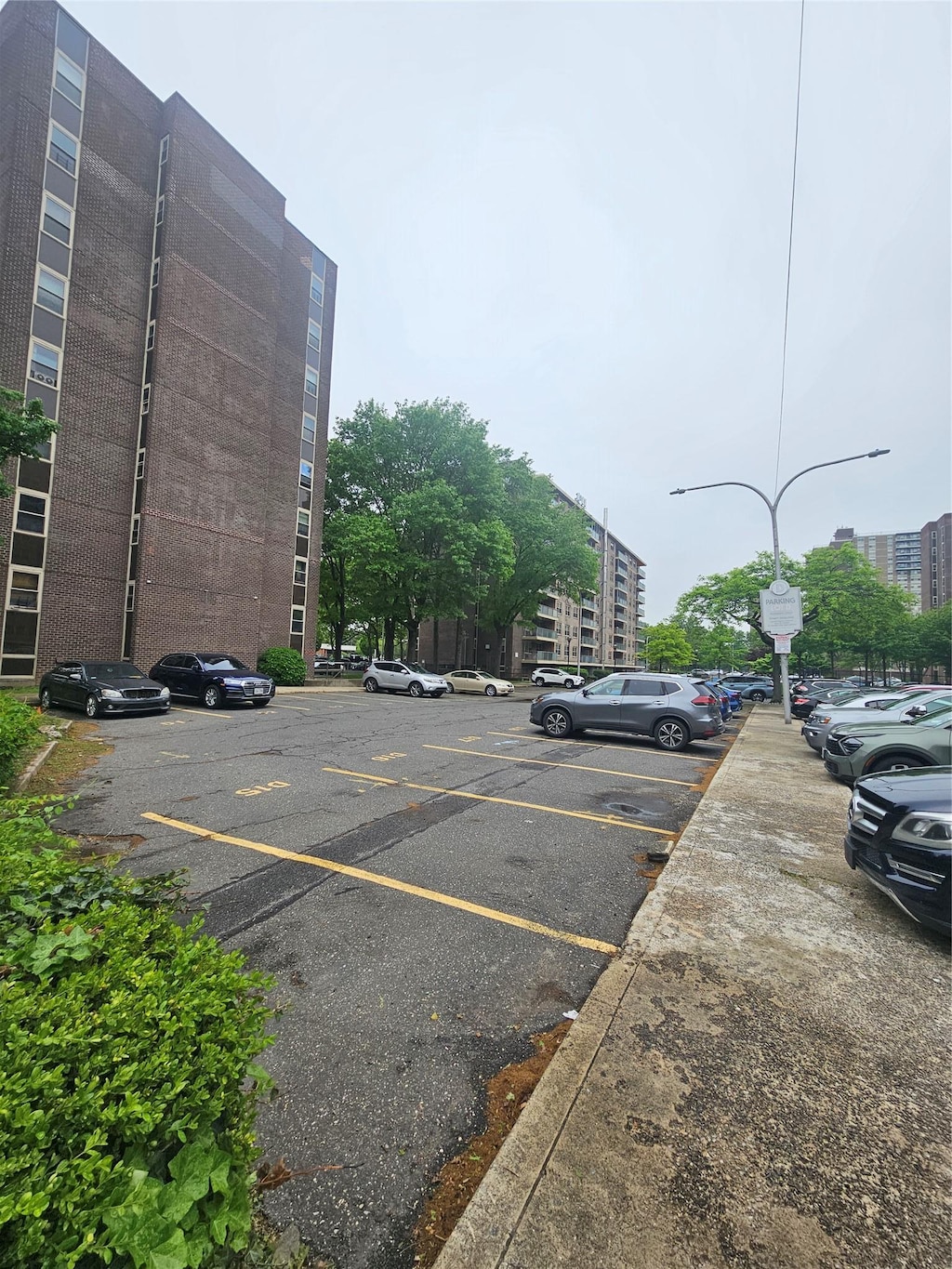 240 Cozine Ave Unit 5B, Brooklyn, NY 11207 - view of uncovered parking lot