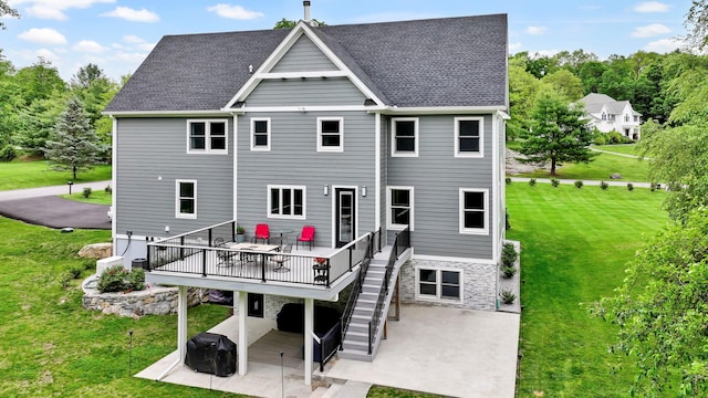15 Somers Hills Rd, Carmel, NY 10512 - back of house featuring a patio area, stairs, a yard, a wooden deck, and stone siding