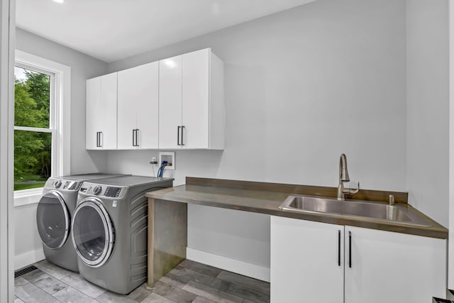 15 Somers Hills Rd, Carmel, NY 10512 - washroom with cabinet space, washing machine and dryer, and baseboards
