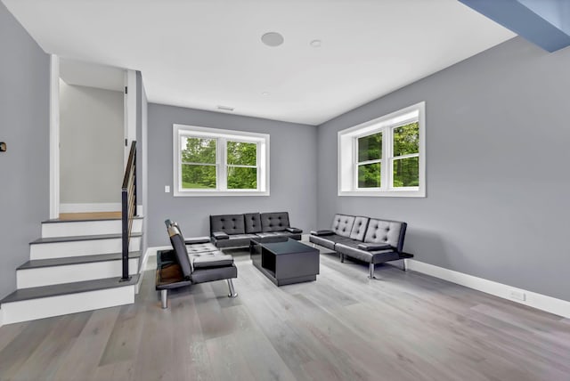 15 Somers Hills Rd, Carmel, NY 10512 - living room with wood finished floors, stairway, and baseboards
