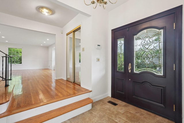 2 Sagamore Ave, Suffern, NY 10901 - entryway with a chandelier and stairs