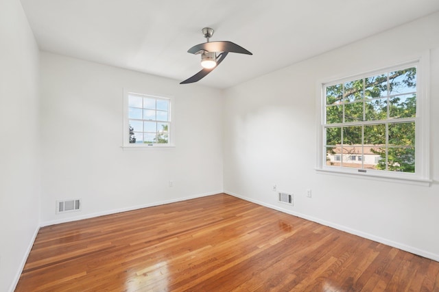 2 Sagamore Ave, Suffern, NY 10901 - unfurnished room with healthy amount of natural light, wood-type flooring, and a ceiling fan