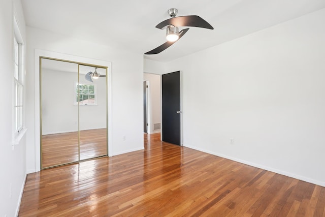2 Sagamore Ave, Suffern, NY 10901 - unfurnished bedroom featuring a closet, light wood-style flooring, and a ceiling fan