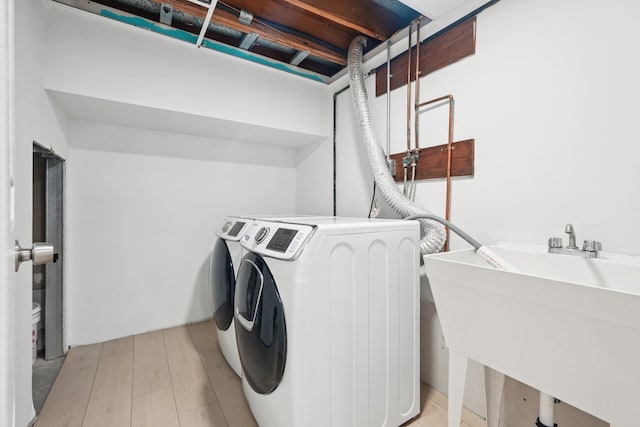 2 Sagamore Ave, Suffern, NY 10901 - washroom featuring washer and dryer and light wood-type flooring