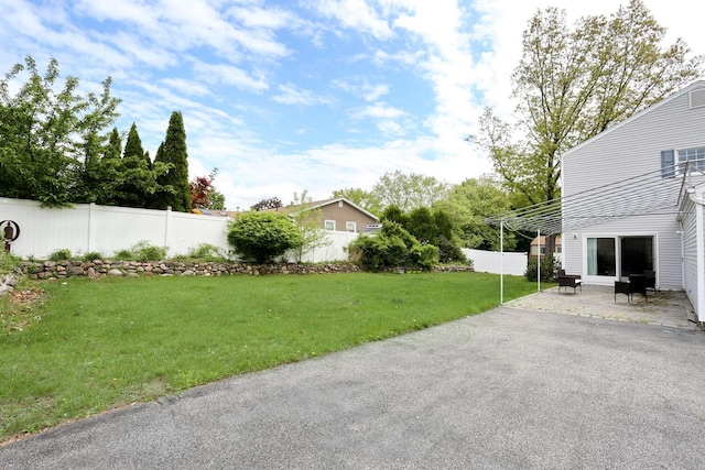 2 Sagamore Ave, Suffern, NY 10901 - fenced backyard with a patio