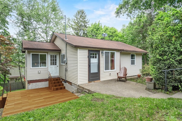 22 Claremont Trl, Monroe, NY 10950 - back of house with entry steps, a patio, and roof with shingles