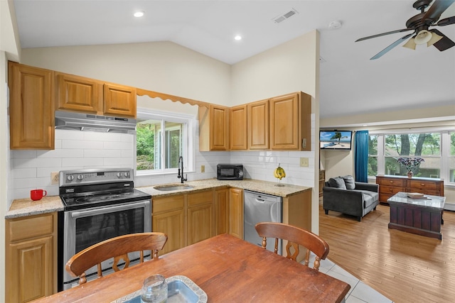22 Claremont Trl, Monroe, NY 10950 - kitchen featuring stainless steel appliances, a sink, under cabinet range hood, vaulted ceiling, and a ceiling fan
