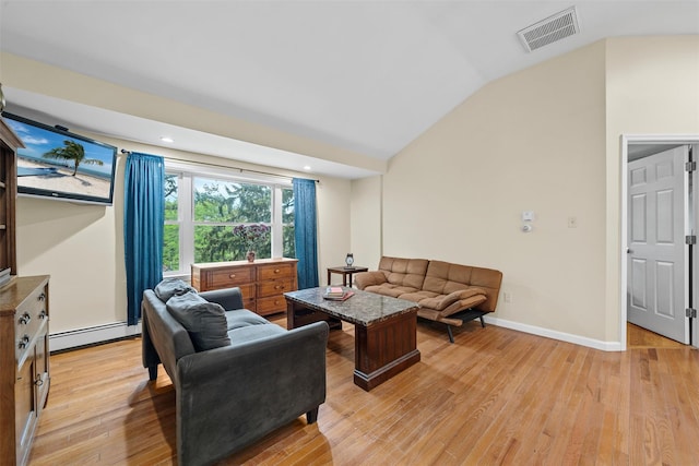 22 Claremont Trl, Monroe, NY 10950 - living area with lofted ceiling, a baseboard heating unit, light wood-style flooring, and baseboards