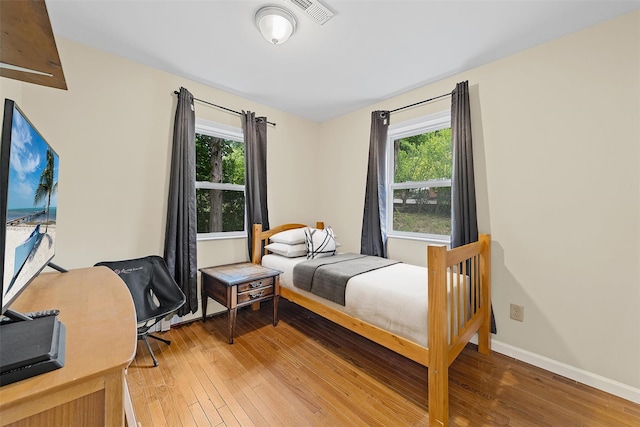 22 Claremont Trl, Monroe, NY 10950 - bedroom featuring light wood finished floors, multiple windows, and baseboards