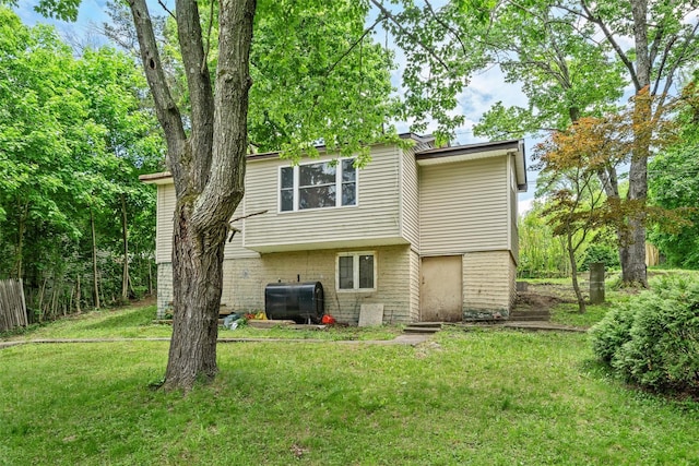 22 Claremont Trl, Monroe, NY 10950 - back of house featuring heating fuel and a lawn