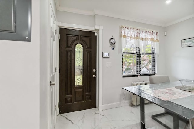 987 Pierce Ave, Bronx, NY 10462 - foyer entrance with ornamental molding, light marble finish flooring, and baseboards