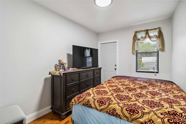 987 Pierce Ave, Bronx, NY 10462 - bedroom featuring light wood-style floors and baseboards