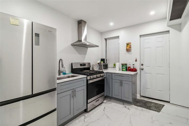 987 Pierce Ave, Bronx, NY 10462 - kitchen featuring stainless steel appliances, wall chimney range hood, gray cabinets, a sink, and recessed lighting