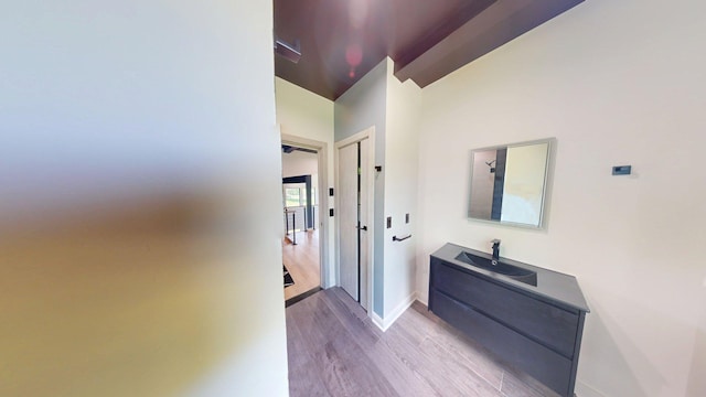 30 Coleman Dr, Campbell Hall, NY 10916 - hall featuring a sink, wood finished floors, and baseboards