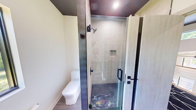 30 Coleman Dr, Campbell Hall, NY 10916 - bathroom with toilet, a stall shower, baseboards, and wood finished floors