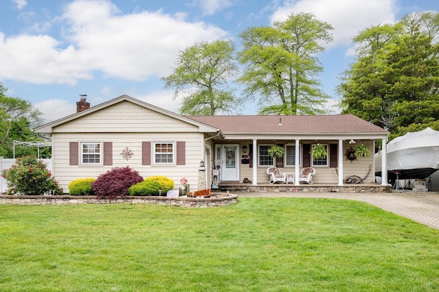 1 Angelica Ct, West Babylon, NY 11704 - view of front of home featuring a chimney, covered porch, and a front lawn