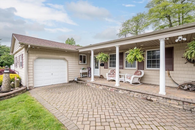 1 Angelica Ct, West Babylon, NY 11704 - ranch-style home featuring a porch, a garage, and decorative driveway
