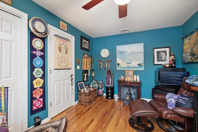 1 Angelica Ct, West Babylon, NY 11704 - sitting room featuring light wood-type flooring, ceiling fan, and baseboards