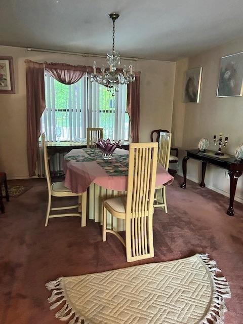 5 Estelle Rd, Poughkeepsie, NY 12601 - carpeted dining space featuring a chandelier