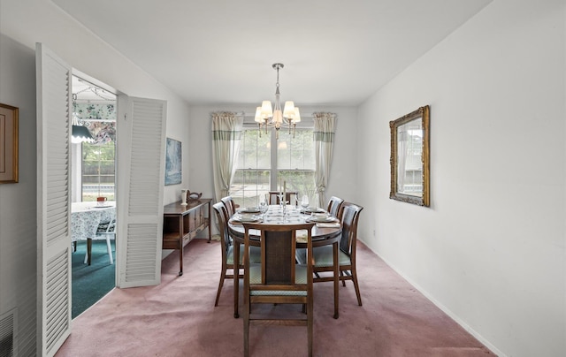 9 Gull Dr, Hauppauge, NY 11788 - dining area with a chandelier, carpet floors, and baseboards