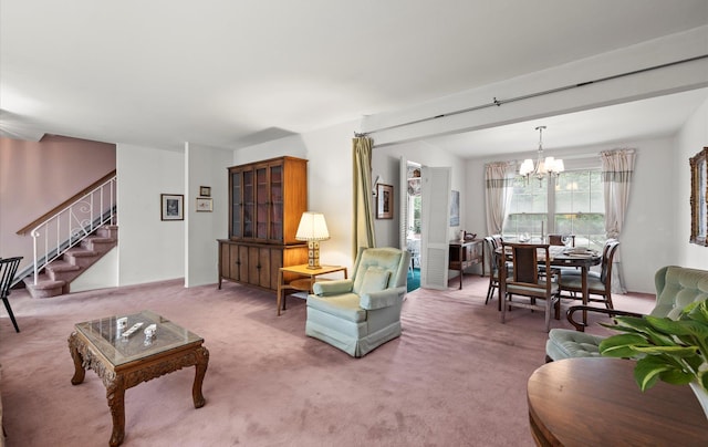 9 Gull Dr, Hauppauge, NY 11788 - living room with a chandelier, stairs, and light carpet