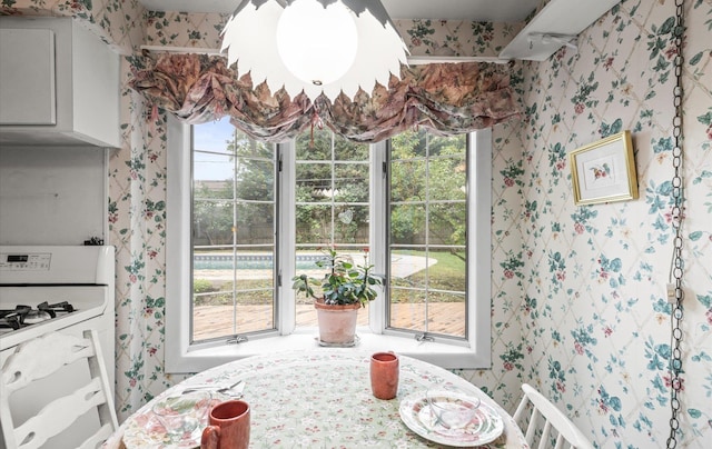 9 Gull Dr, Hauppauge, NY 11788 - dining space with wallpapered walls
