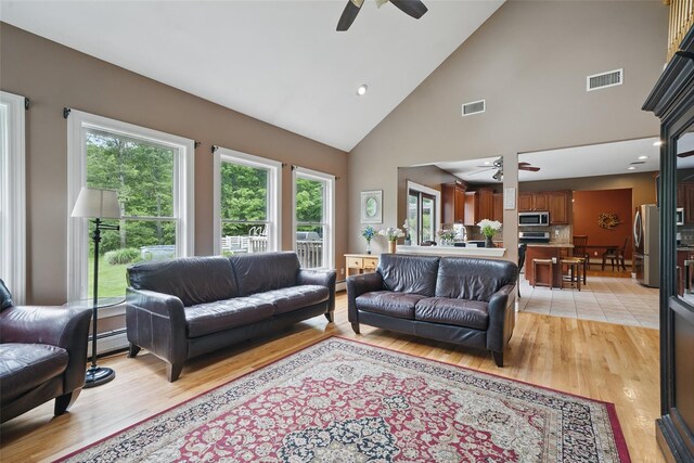 7 Gabriels Dr, Chester, NY 10918 - living room featuring ceiling fan, high vaulted ceiling, light wood finished floors, and recessed lighting