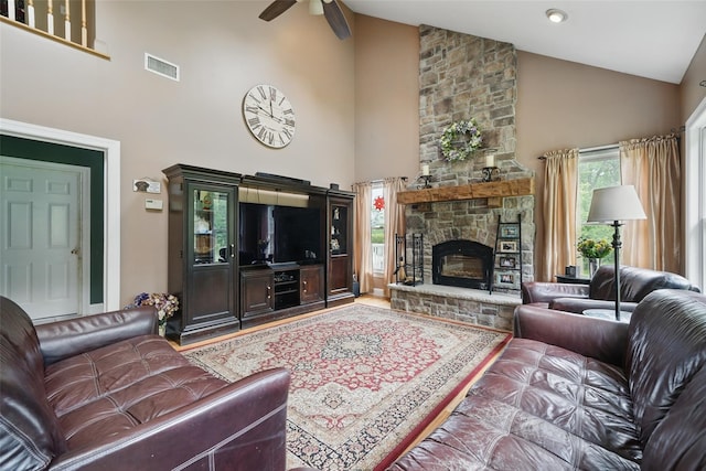 7 Gabriels Dr, Chester, NY 10918 - living area with high vaulted ceiling, ceiling fan, a stone fireplace, and wood finished floors