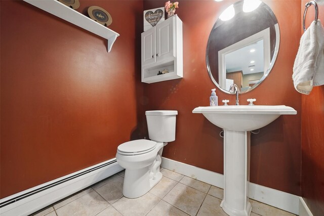 7 Gabriels Dr, Chester, NY 10918 - bathroom with a baseboard heating unit, toilet, baseboards, and tile patterned floors