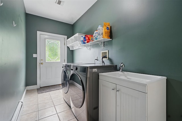 7 Gabriels Dr, Chester, NY 10918 - washroom featuring a baseboard radiator, separate washer and dryer, baseboards, and light tile patterned floors