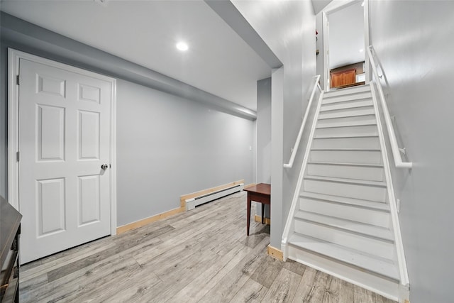 7 Gabriels Dr, Chester, NY 10918 - stairway featuring baseboard heating, wood finished floors, baseboards, and recessed lighting