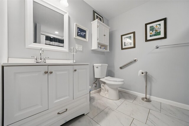 7 Gabriels Dr, Chester, NY 10918 - bathroom with marble finish floors, toilet, baseboards, and vanity