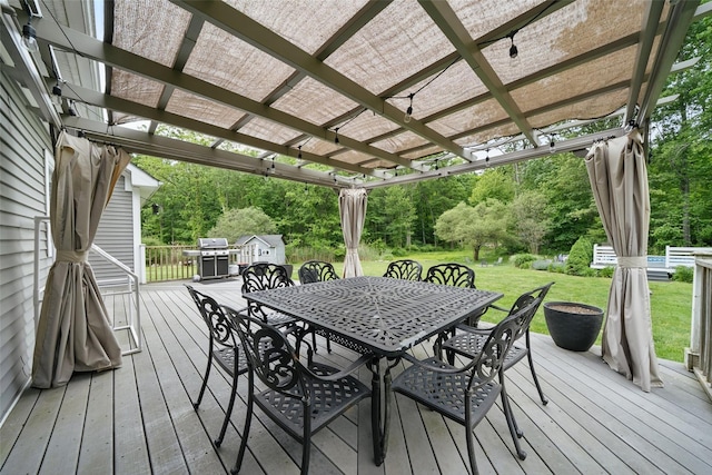 7 Gabriels Dr, Chester, NY 10918 - deck featuring outdoor dining area, a yard, grilling area, a pergola, and view of wooded area
